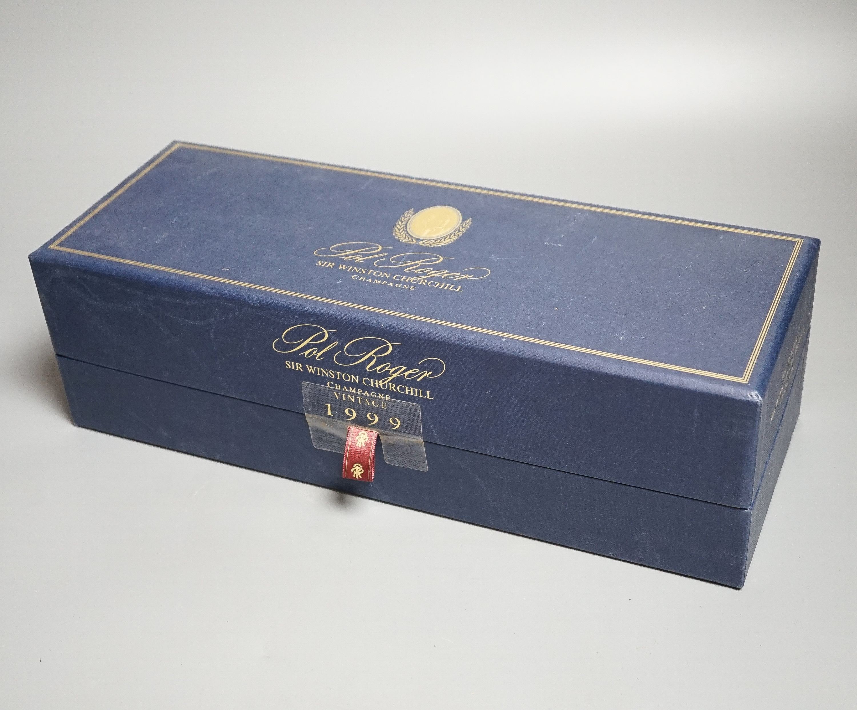 A cased bottle of Pol Roger Sir Winston Churchill champagne 1999